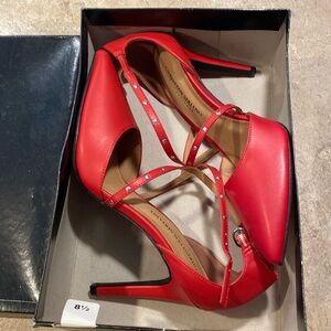 Christian Siriano red heels. Never worn. Size 8.5